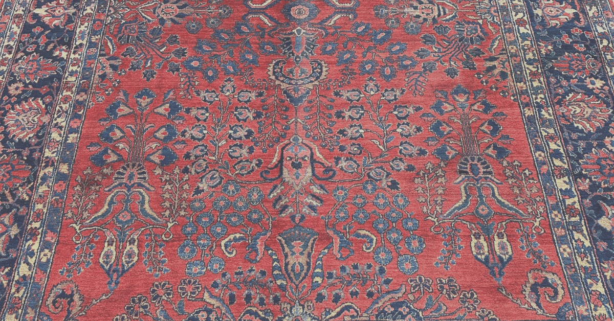 9x12 Persian rug in a luxurious living room setting.