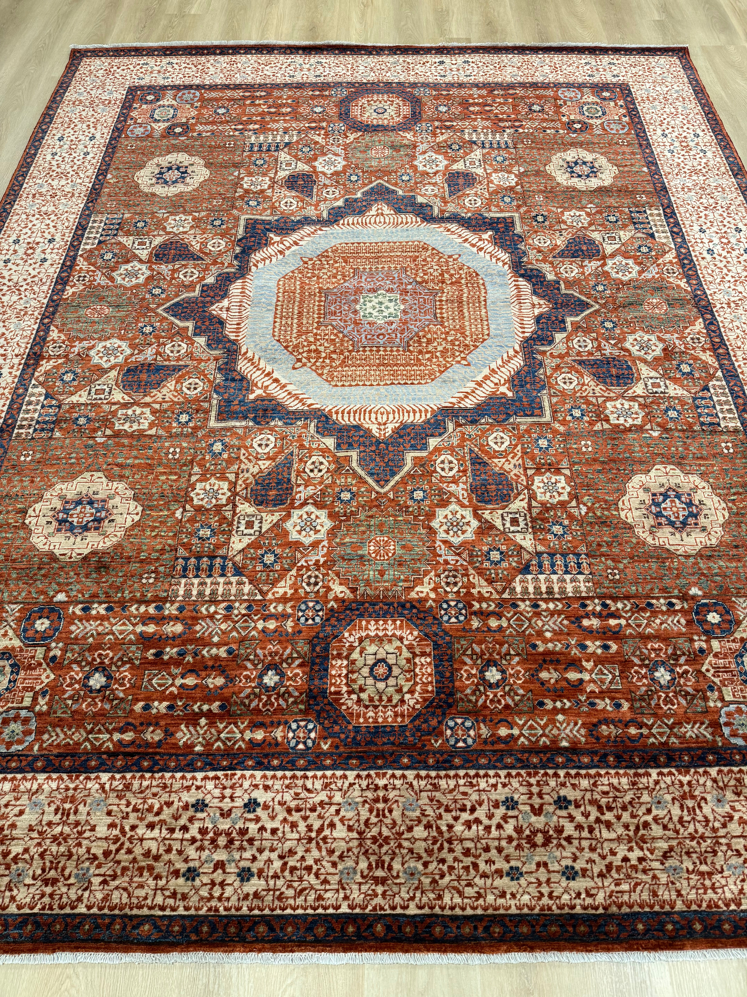 9x12 Persian rug in a luxurious living room setting.