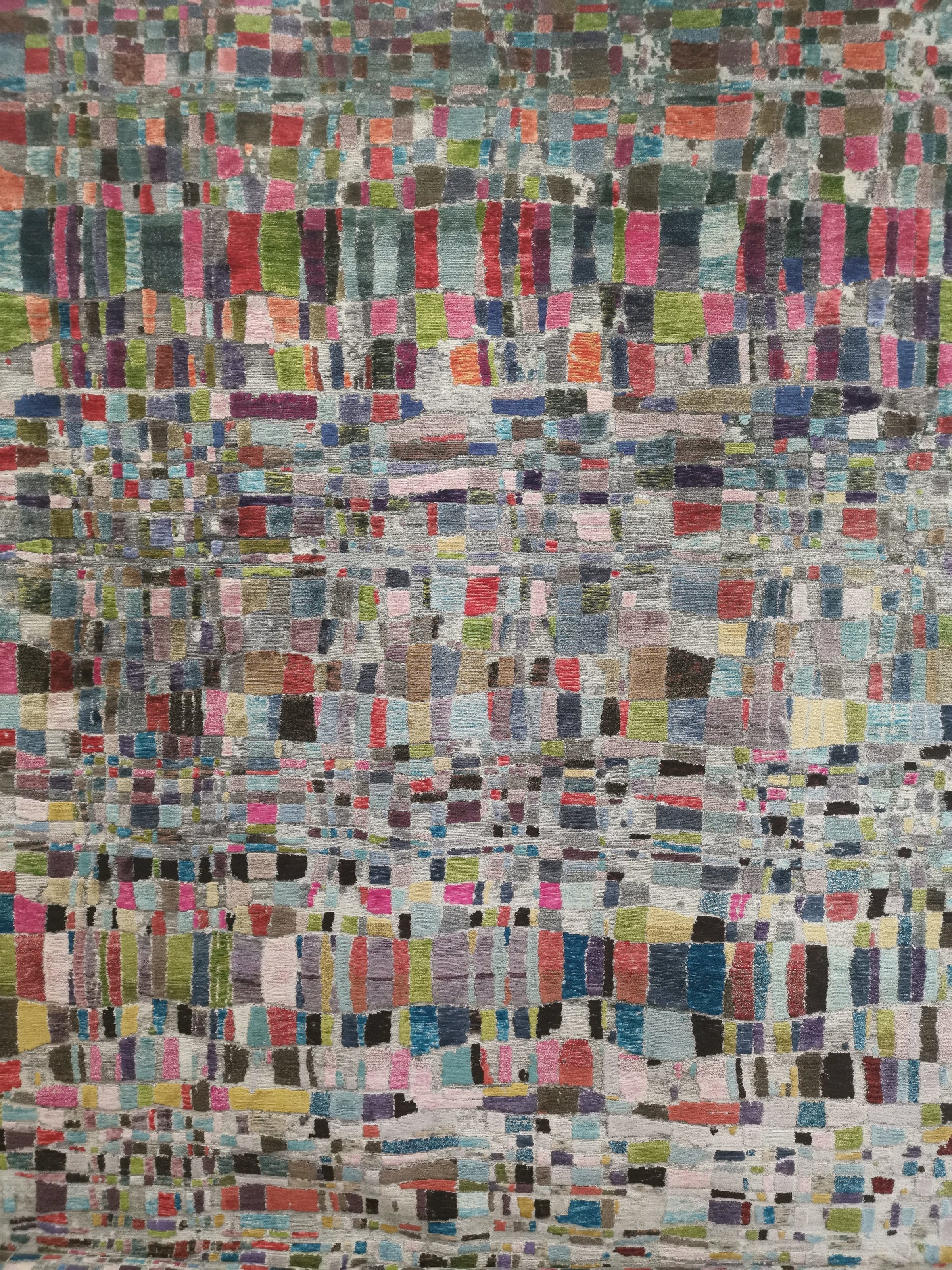 Modern handmade rug with geometric patterns.